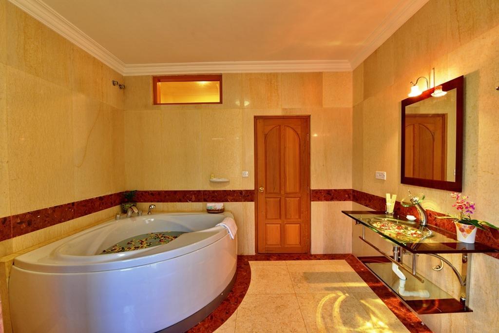 Win Unity Hotel Pyin Oo Lwin Rom bilde